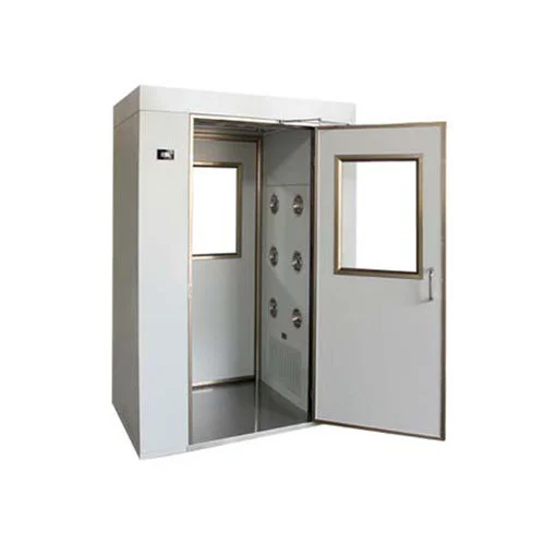 Técnico en traje blanco realizando prueba en cuarto limpio con equipo KIMO - AZVIR Cleanrooms